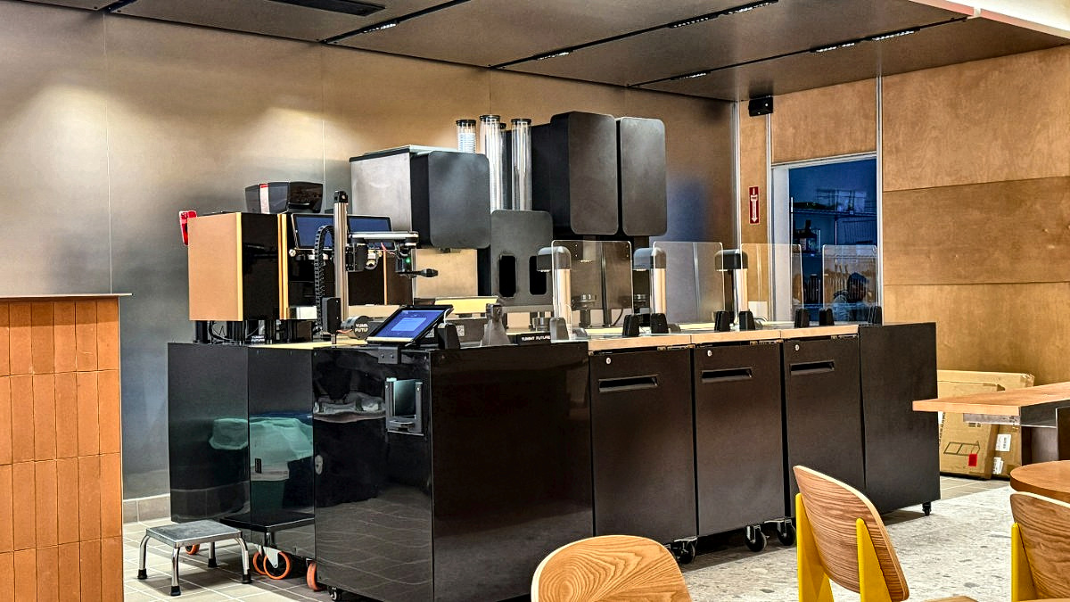 A Yummy Future robot bar standing in an office lobby